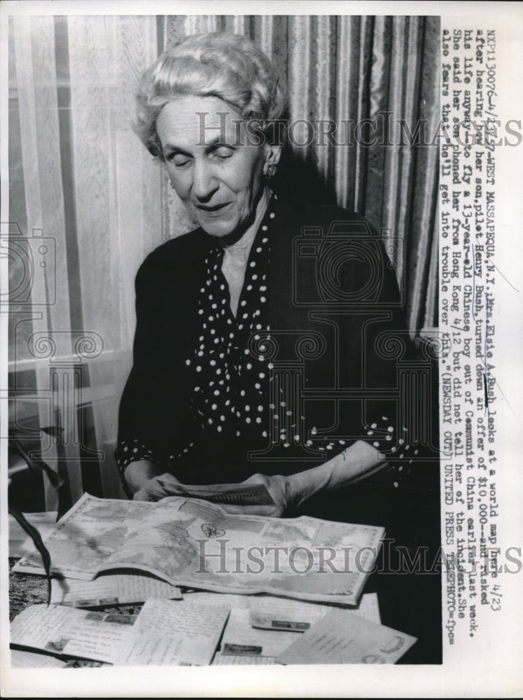 1957 W. Massapequa, NY Mrs Elsie Bush hears of son war deeds - Historic Images