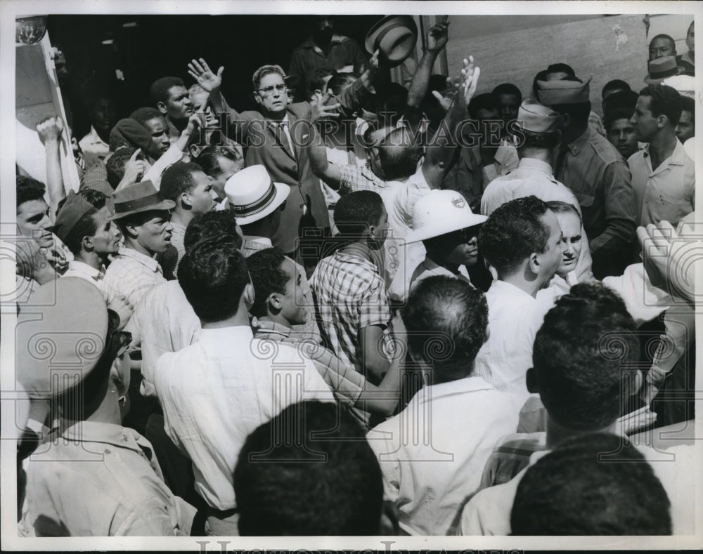 1961 Press Photo Opposition Leader Attempts To Calm Protestors During Rally - Historic Images