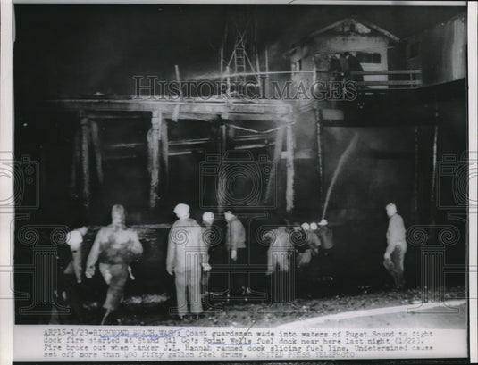 1953 Coast Guardsmen Wade Into Waters Of Puget Sound To Fight Fire - Historic Images