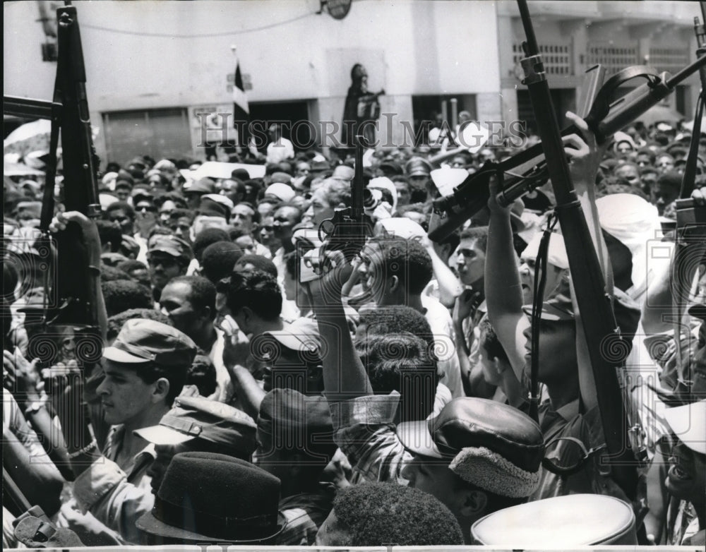 1965 Pro Castro react to Francisco Caamano Deno speech in D.R. - Historic Images