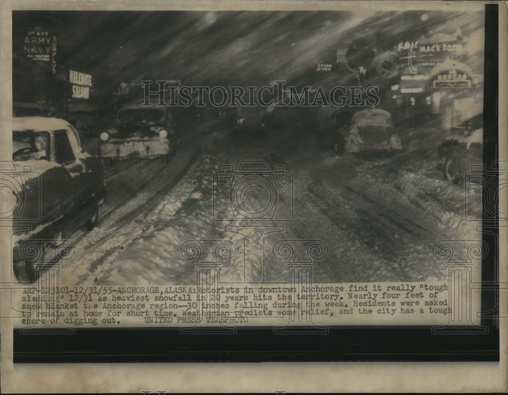 1955 Press Photo Residents in Anchorage, Alaska experiencing heaviest snowfall - Historic Images