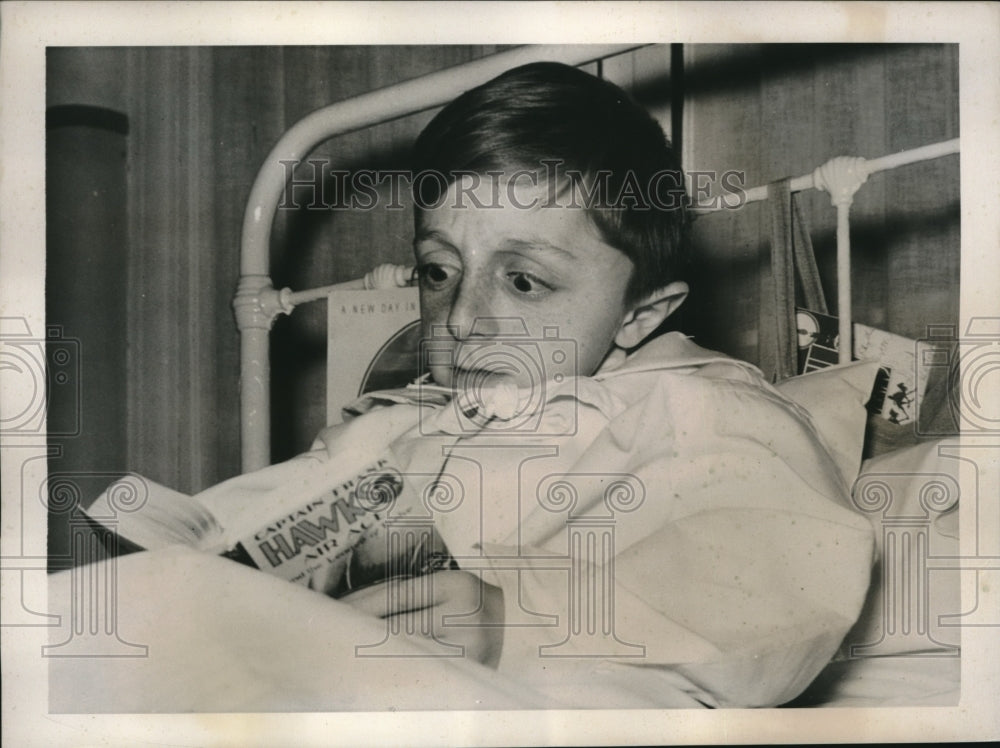 1939 David Bunting recovers from 52nd bone fracture. - Historic Images
