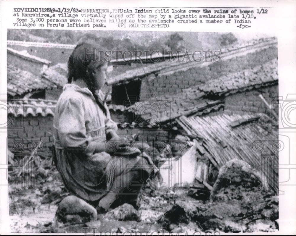 1962 Press Photo Indian Child Looks At Ruins of Homes in Ranrahirca Peru - Historic Images