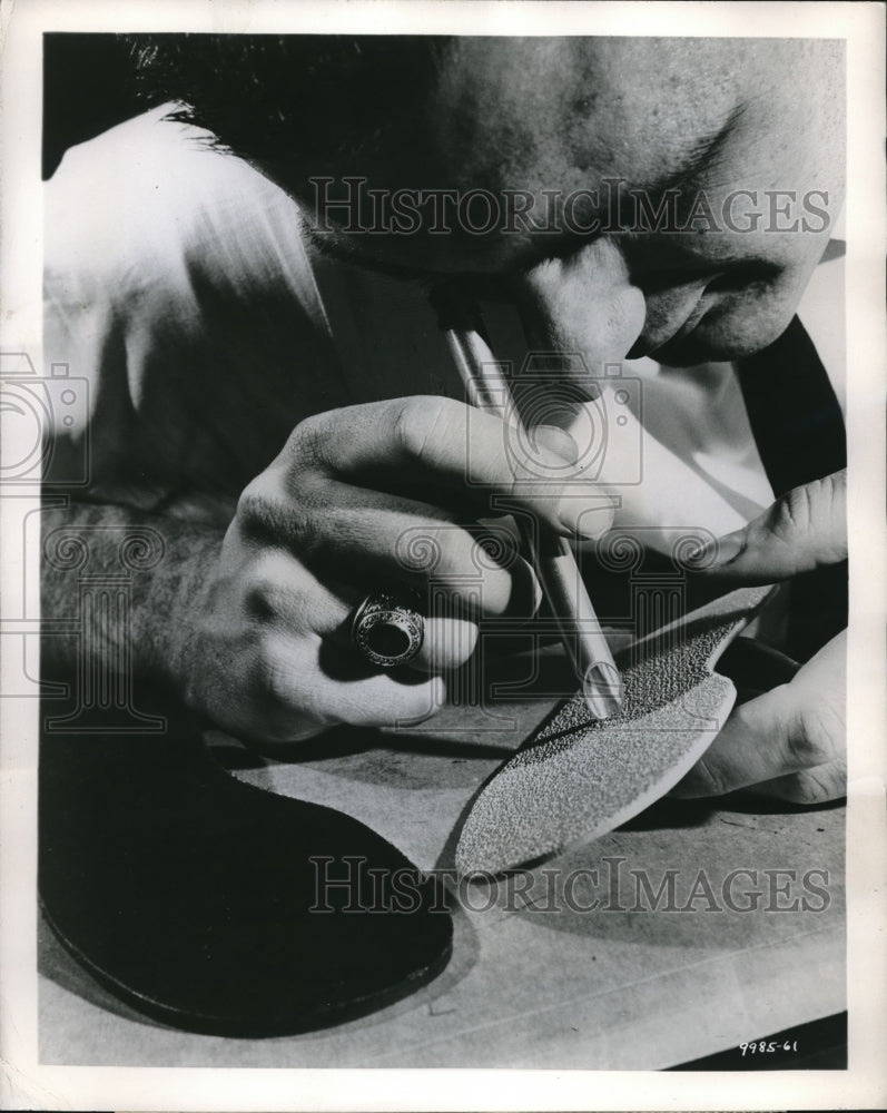 1961 Press Photo Goodyear Shoe Tech Examines Modern Rubber Shoe Sole Technology - Historic Images