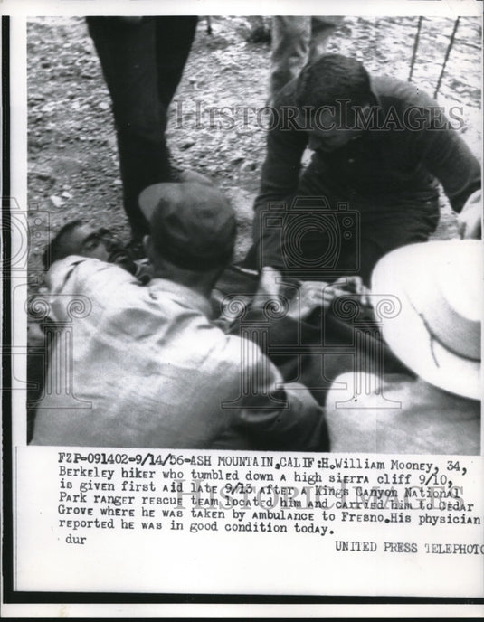 1956 Press Photo William Mooney Given First Aid By Park Ranger After Fall-Historic Images