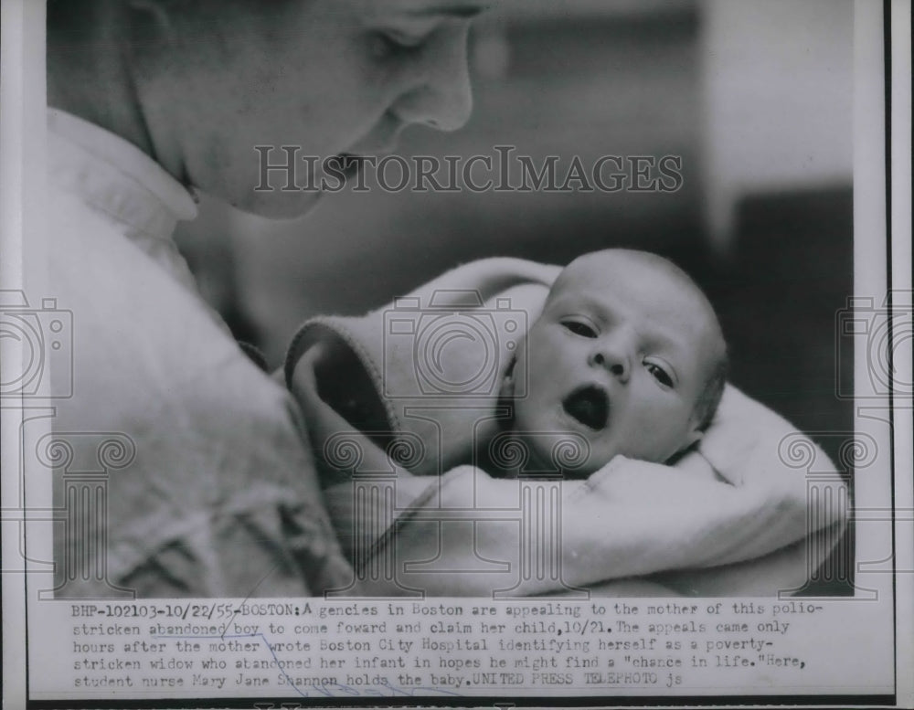 1955 Tiny Abandoned Baby Yawns While Being Held By Mary Jane Shannon - Historic Images