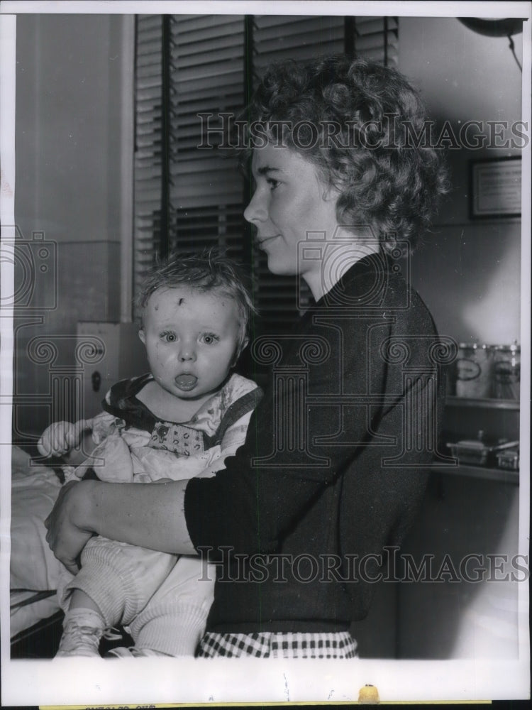 1961 Press Photo Mrs. Ernest Stevens Holding Son Ernest Jr. After Tornado-Historic Images