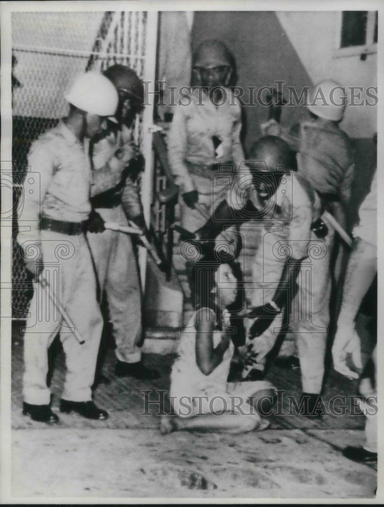 1961 Press Photo Woman Beaten by Dominion Police During Demonstration - Historic Images