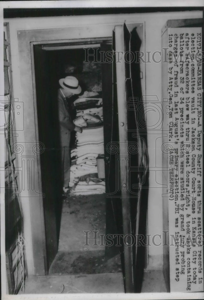 1947 Deputy Sheriff Sorts Election Vault in Jackson County - Historic Images