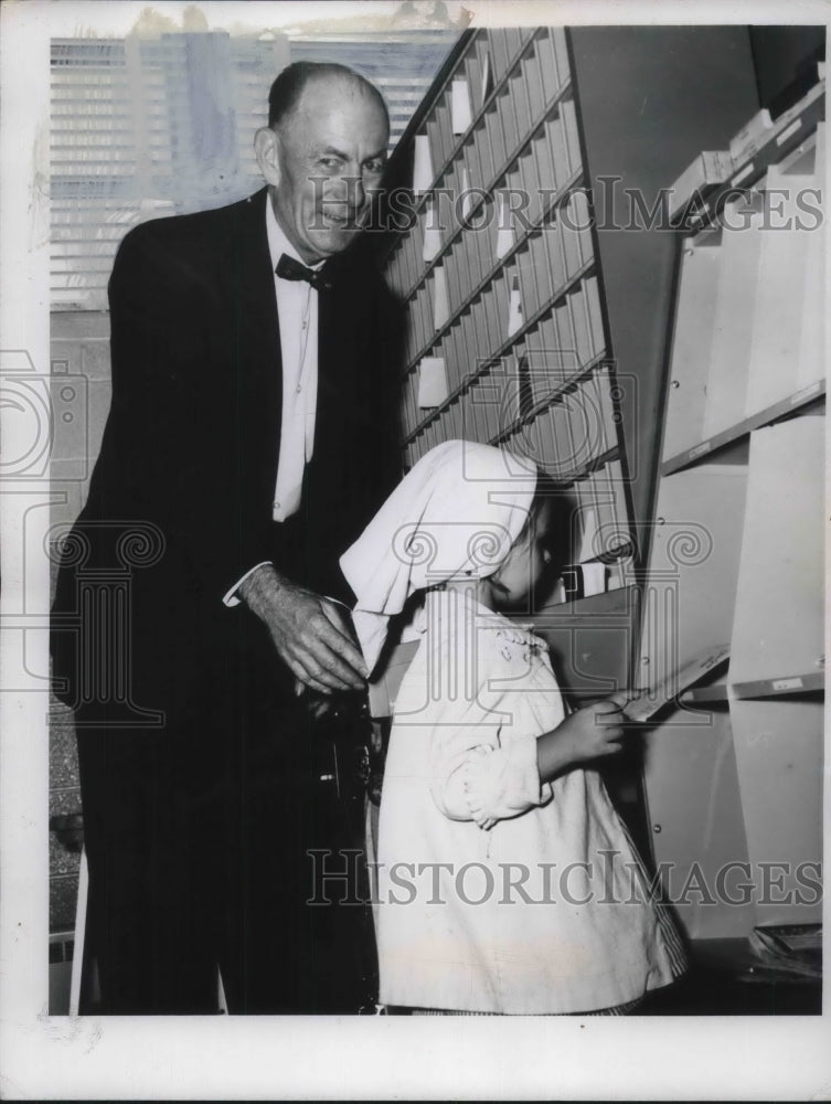 1962 Linda Pristash and Postmaster Glen Carver at Mentor P.O. - Historic Images