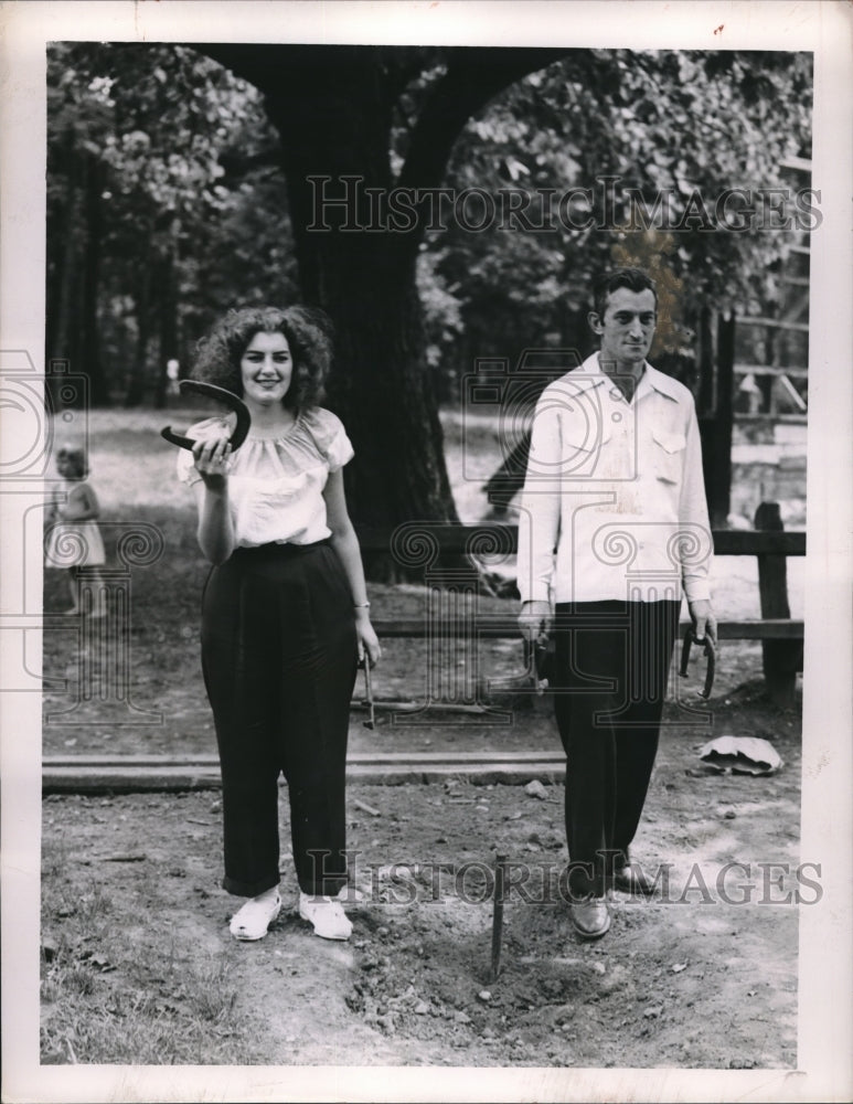 1951 Rachel Bradley &amp; Donald Burns Play Horseshoes - Historic Images