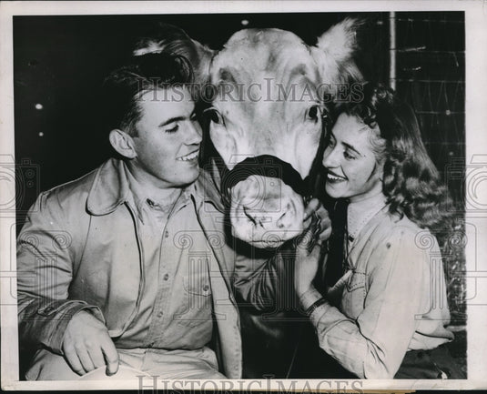 1947 Kathryn Anne McKinley w/ her Champion Steer w/ Leslie Cornwall - Historic Images