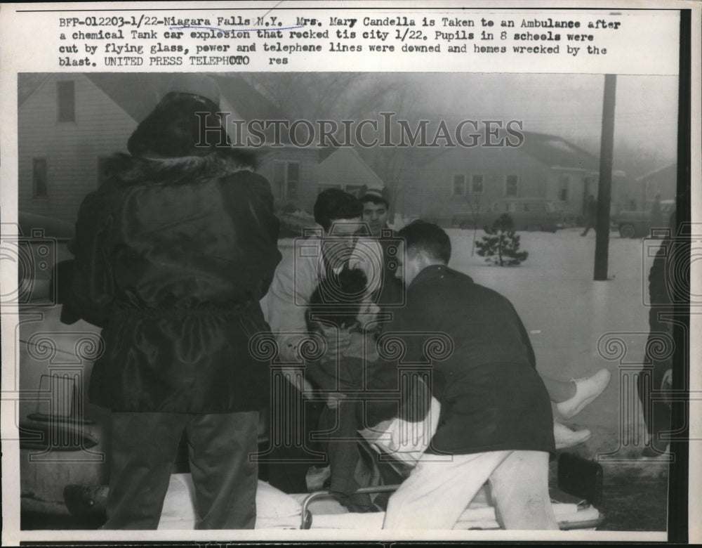 1958 Press Photo Mary Candella taken to ambulance after Chemical explosion - Historic Images