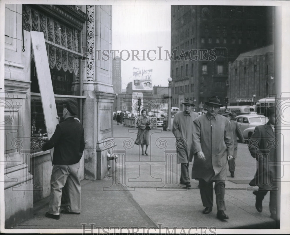 1951 Press Photo Workmen preparing to board window of Wrigley building - Historic Images