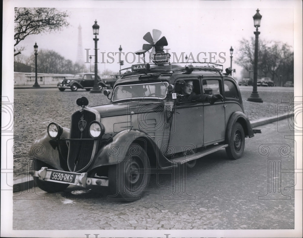 1952 Press Photo Pierre Alidiere Driving Weirdest Cab in Paris, France - Historic Images