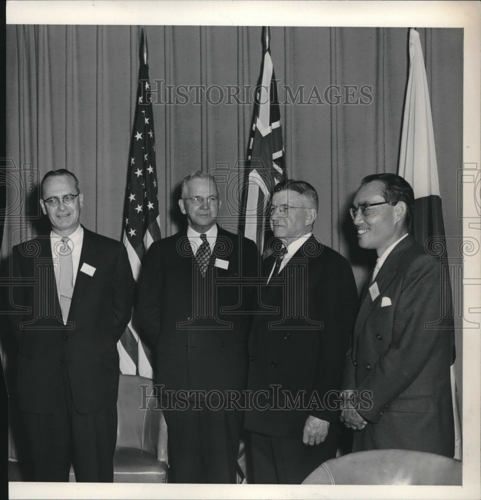 1955 Old Men In Suits And Horn Rimmed Glasses In Front Of Flags - Historic Images