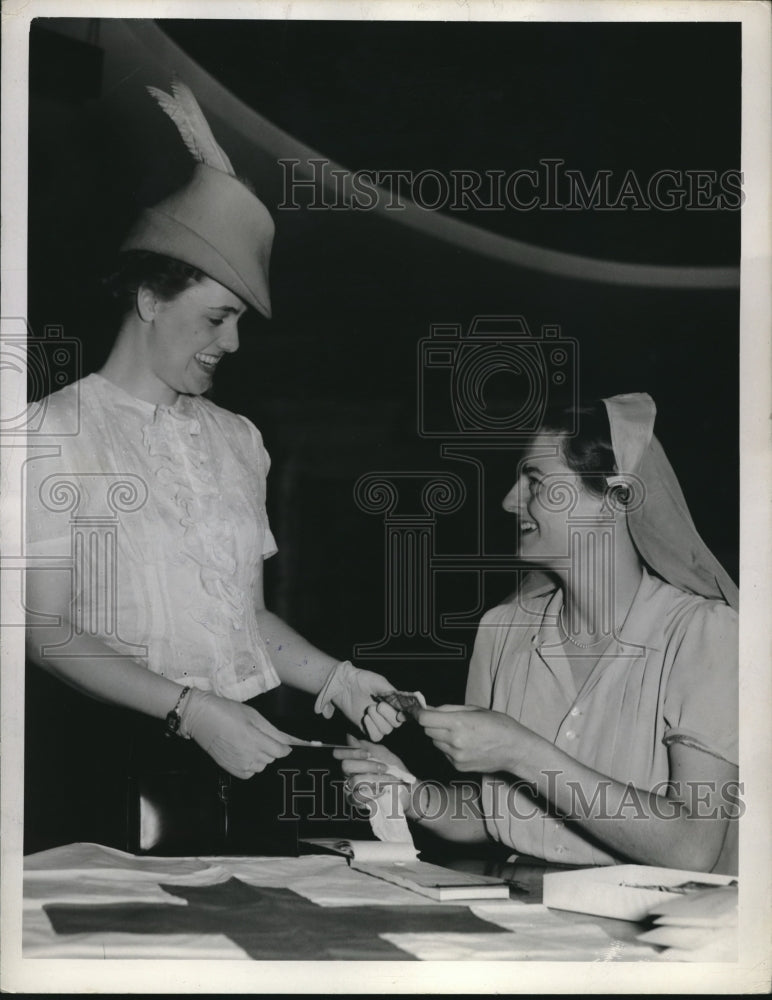 1940 Ardene Thomas &amp; Phobe Flory at organizing a Red Cross event - Historic Images