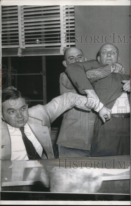 1954 Press Photo Central High Principal H.G.Roy is restrained by school board-Historic Images
