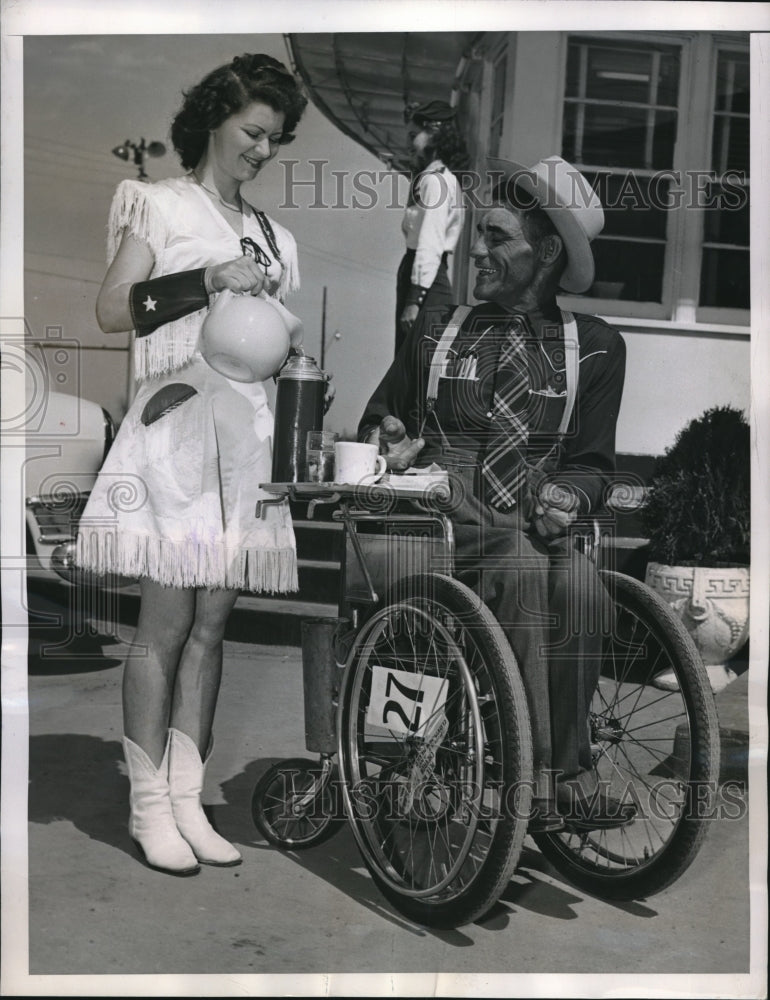 1949 Marie Phillips Refills Drink For Bill Lebow As He Travels - Historic Images