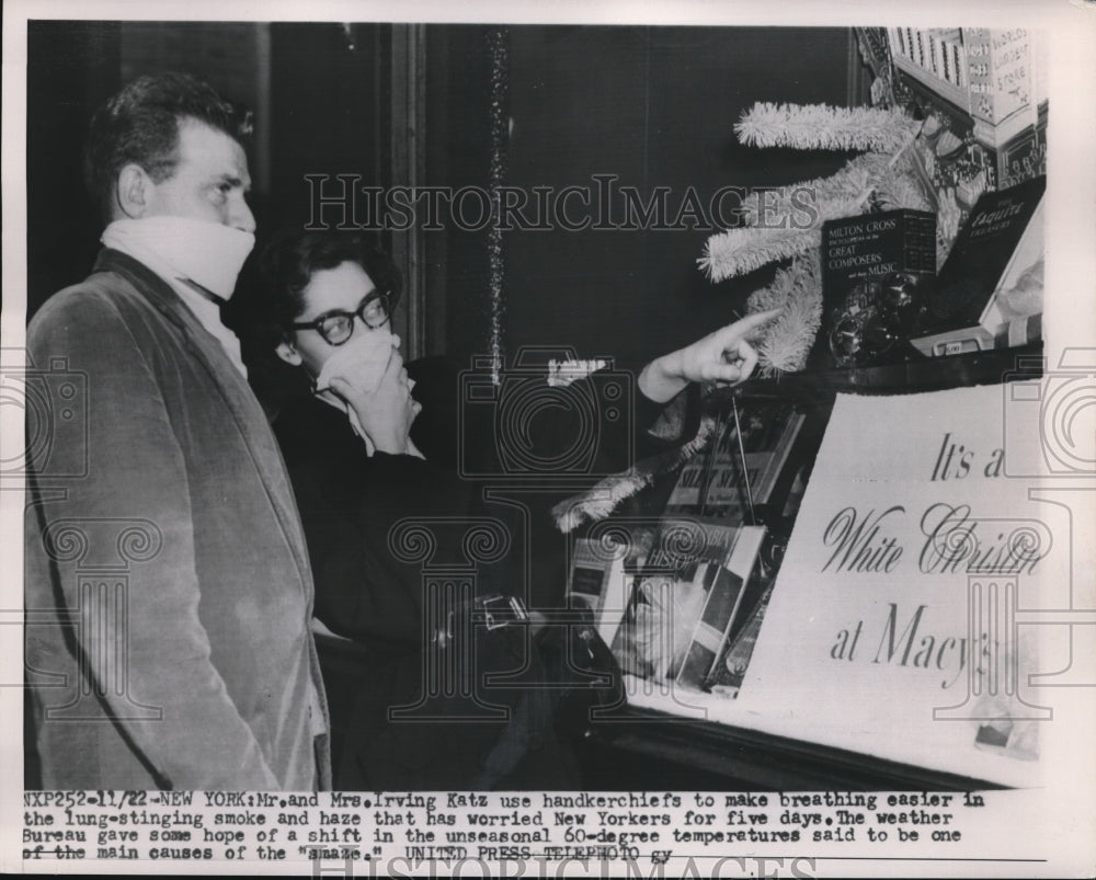 1953 Mr. and Mrs. Irving Katz struggle to breathe in New York haze - Historic Images