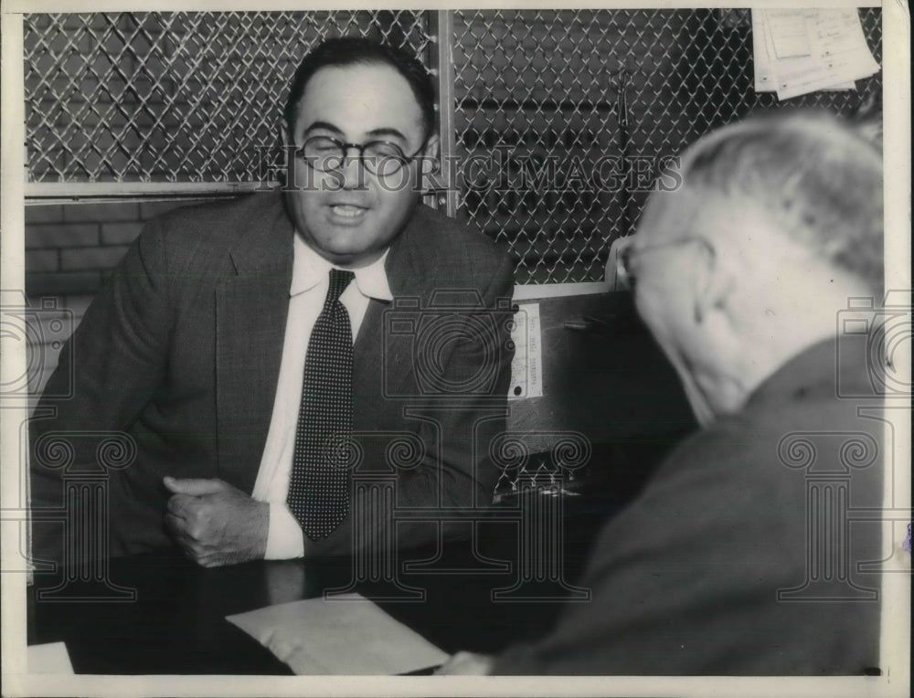 1936 Press Photo Erwin Pete Werner being booked on liquor graft charges - Historic Images