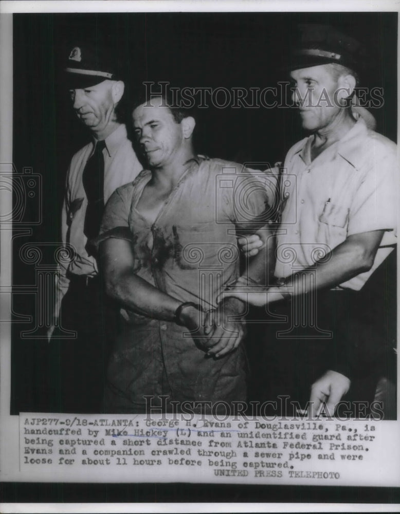 1954 George H. Evans Handcuffed by Mike Hicky and Unidentified guard - Historic Images