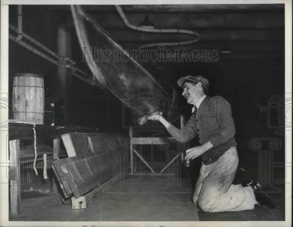 1935 James Cantler preps boat for rowing season-Historic Images