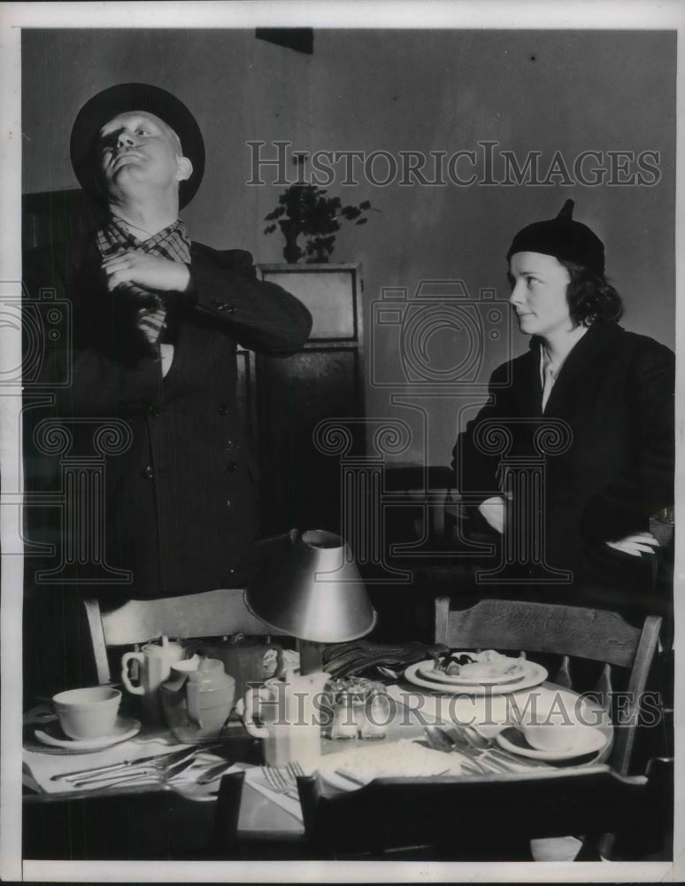 1938 Press Photo Angry Looking woman and man strike a pose - Historic Images