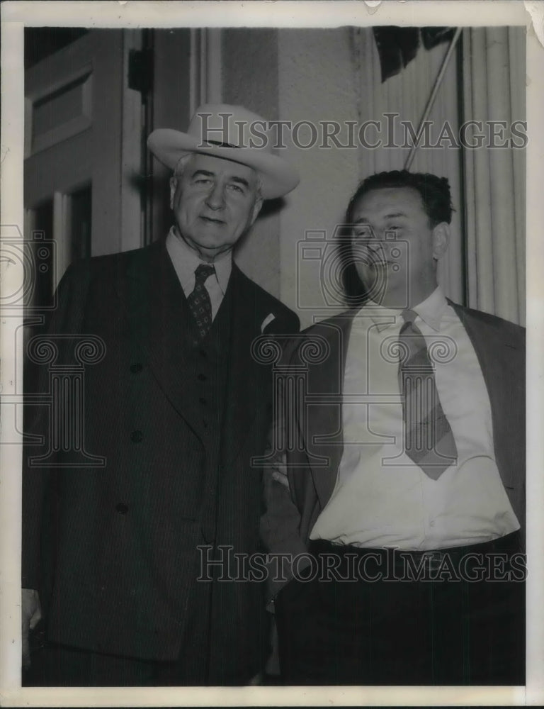 1942 Jesse Jones & Leon Henderson leave the White House after - Historic Images