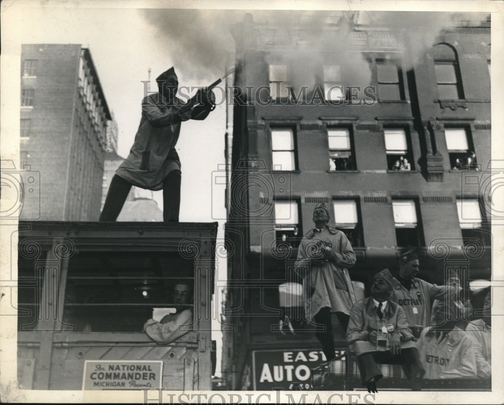 1937 Press Photo Legionaire on top of Train firing gun - Historic Images