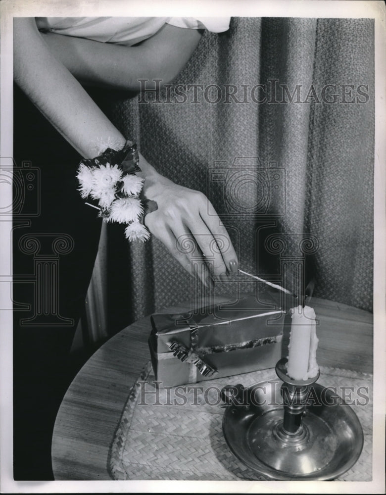 Press Photo candle being lit - Historic Images