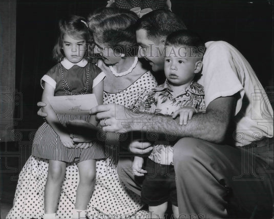 Press Photo Unimpressed Ellen and curious Jeffrey at the Cannery Recreation Hall - Historic Images