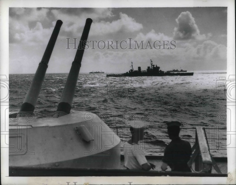 1949 2 sailors aboard the HMS Victorious looking at the HMS Anson-Historic Images