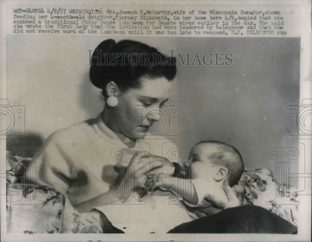 1957 Press Photo Mrs. Joseph R. McCarthy wife of senator feeding her baby.-Historic Images