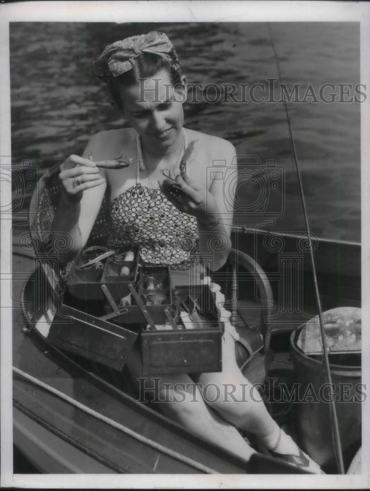1938 Joanne Goodwin can't make out what lure to use - Historic Images