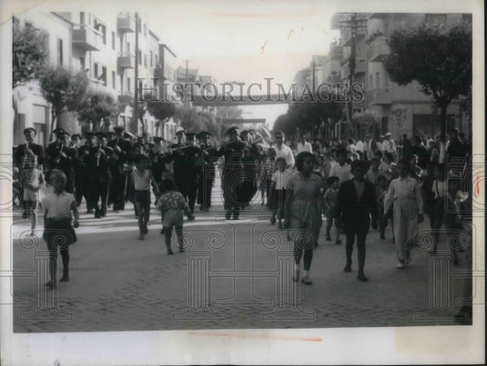1962 Scene from Durress, Albania, where children are meeting a band - Historic Images