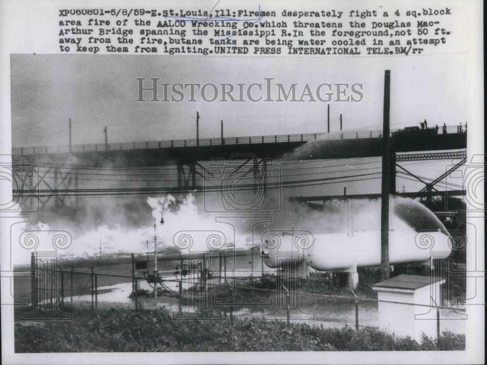 1959 St. Louis, Ill Firemen fight fire AALCO Wrecking Co. - Historic Images