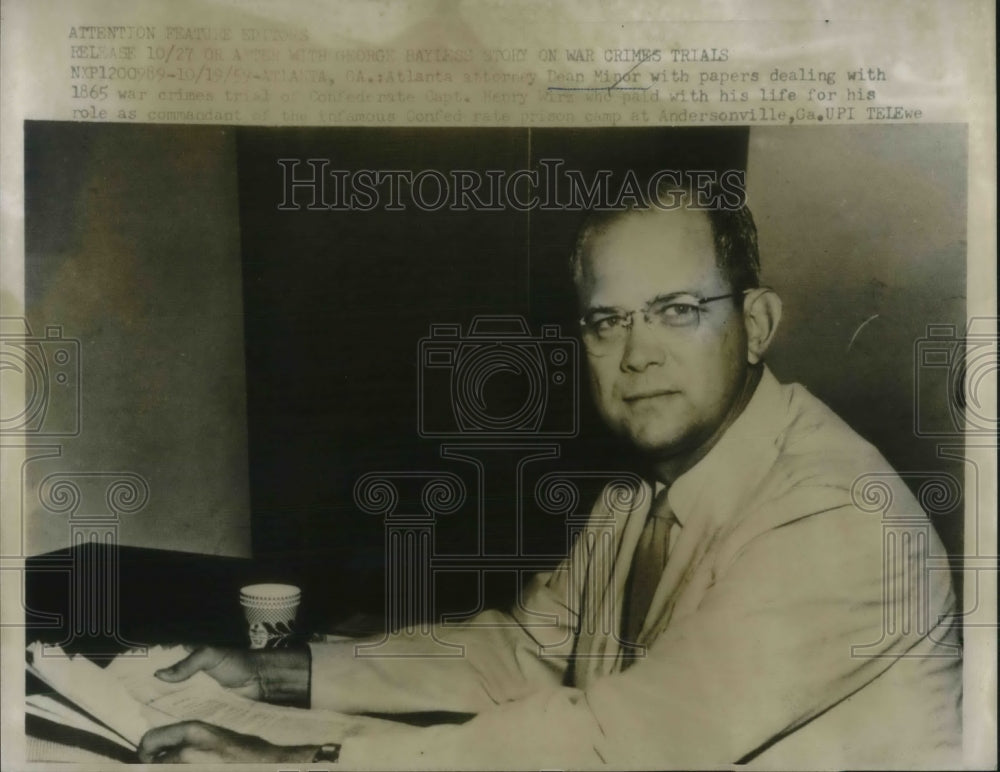 1959 Press Photo Attorney Dean Meyer reviews confederate war crimes of Captain H - Historic Images