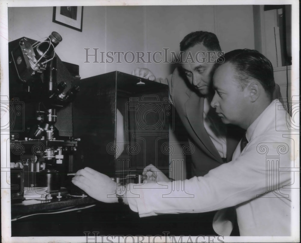 1955 Press Photo Hospital Workers Looks at New Equipment - nec29994 - Historic Images