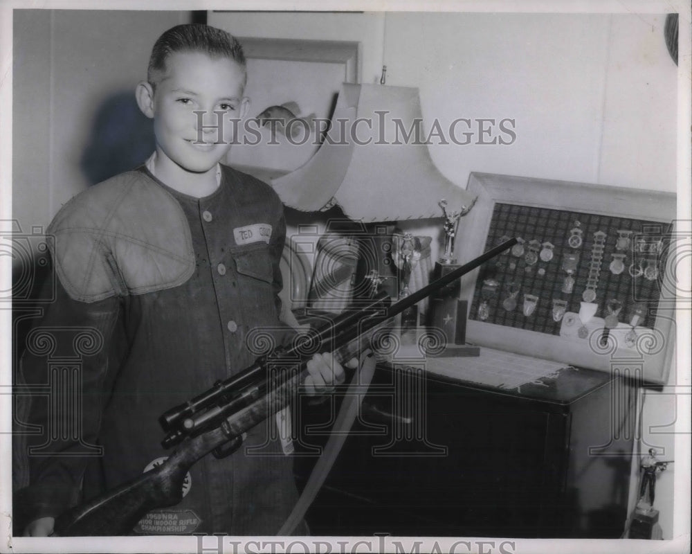 1961 Ted Couch expert marksman at age 13, w/ a riffle on hand - Historic Images