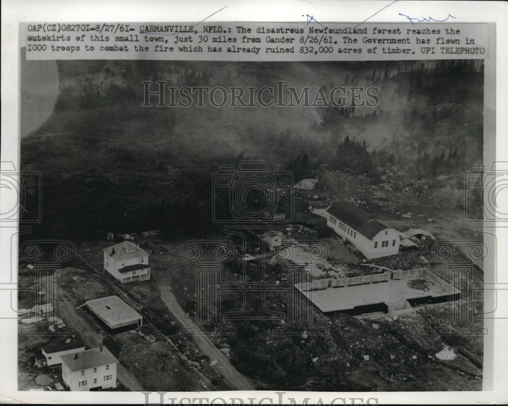 1961 Aerial view of Carmanville, Nfld combating forest fire - Historic Images