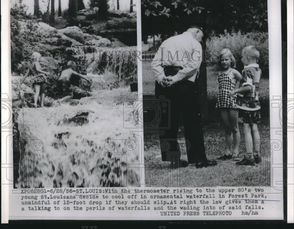 1956 Press Photo Two Kids cool off in ornamental waterfall in Forest Park-Historic Images