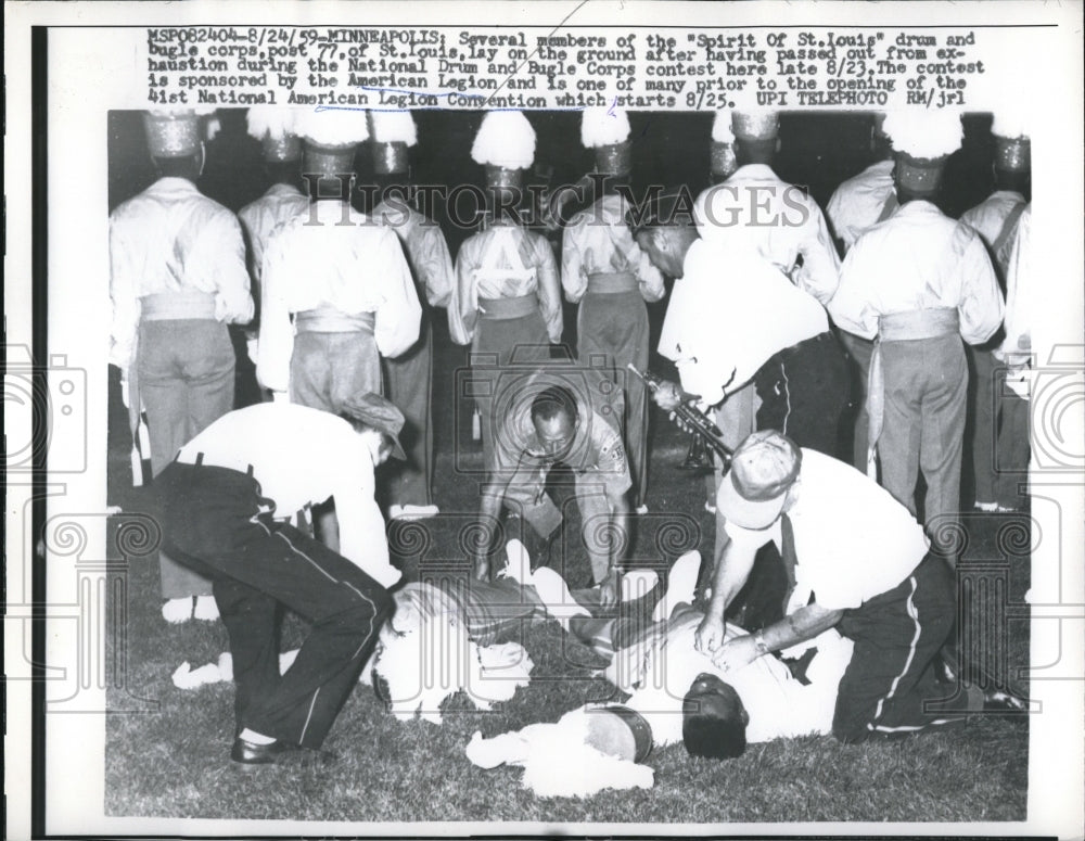 1959 Press Photo Spirit of St. Louis drum and bugle corp. pass out at contest. - Historic Images