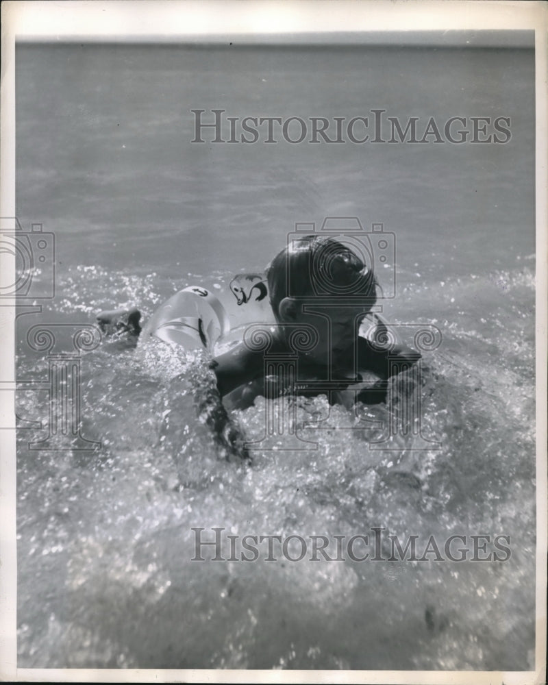 1948 Press Photo Toddler Swims In Swimming Pool With Raft In Miami - nec34149 - Historic Images