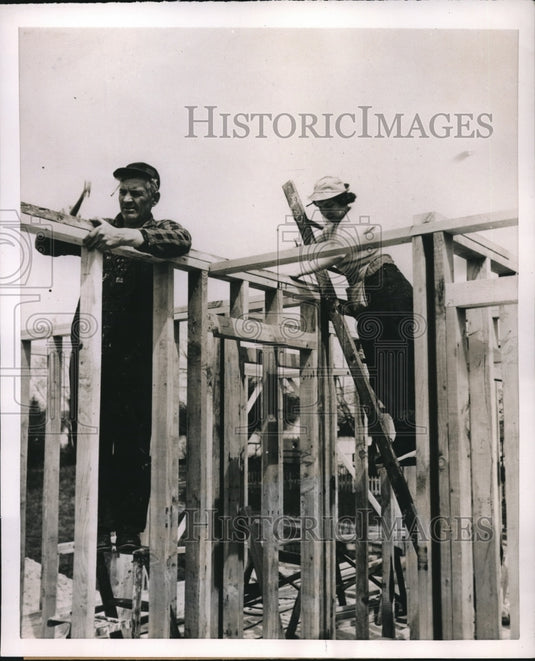 1953 Press Photo Muskegon, Mich Vera Buckley & dad building a house - nec34591 - Historic Images