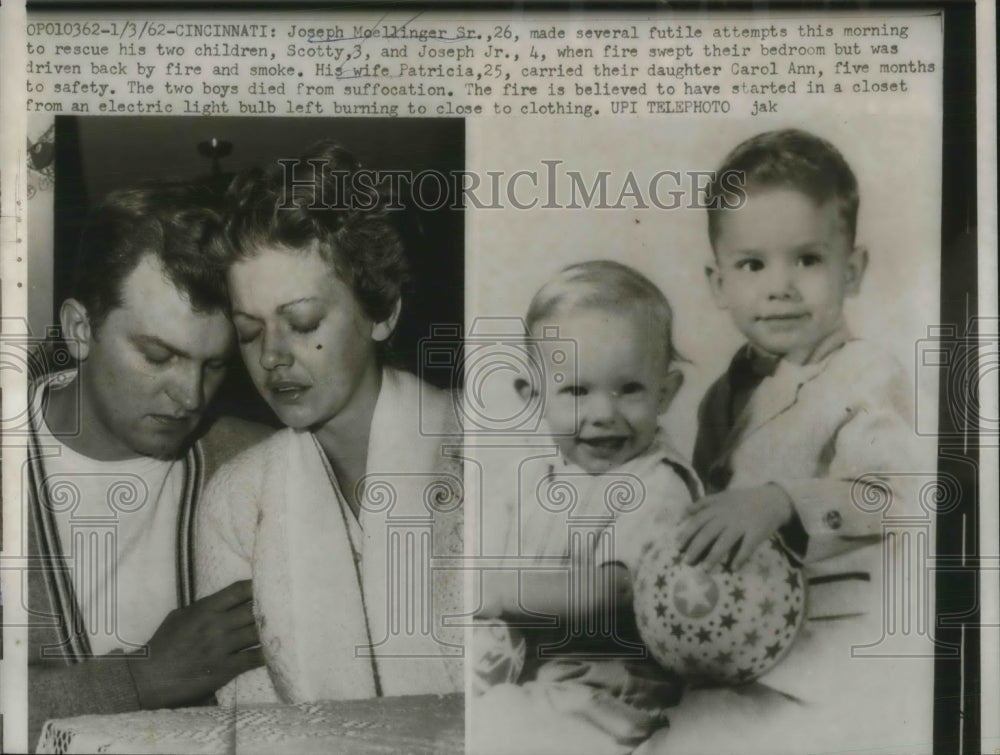 1962 Press Photo Joseph Moellinger attempts to save his two children from fire. - Historic Images