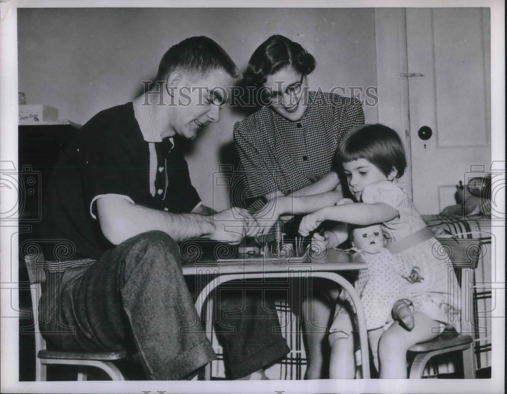 1955 Press Photo Student Nurse Father Sawatzky play with his Daughter Stephany. - Historic Images