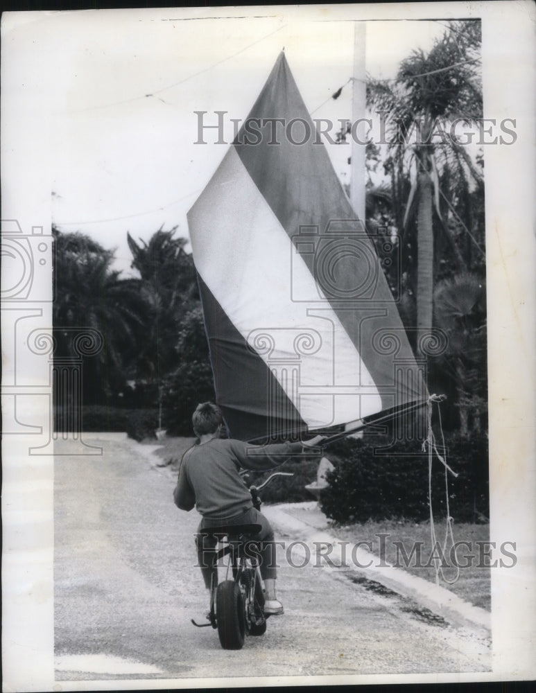 1969 St Petersburg, Fla Mike Sirmons on scooter with a sail - Historic Images