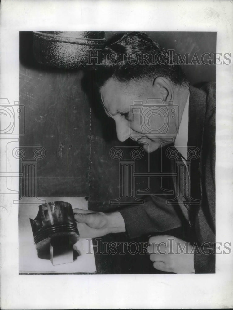 1944 J.A. Sam examines new fluorescent test - Historic Images