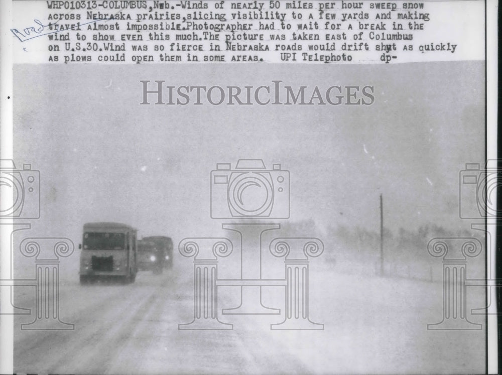 1962 Press Photo Winds Sweeping Snow Across Columbus, Nebraska - Historic Images